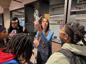 Lucy describes model of a person&#39;s hand made out of resin